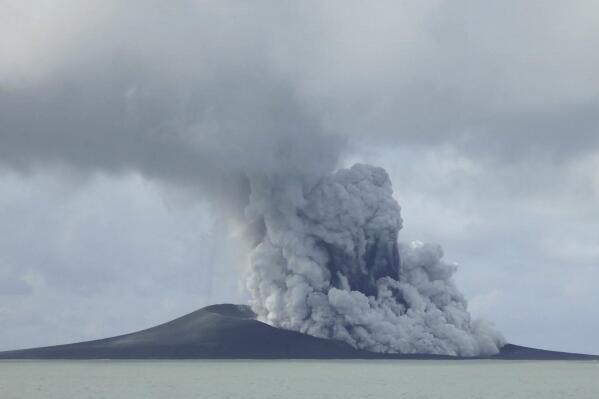 FILE - In this photo provided by New Zealand's Ministry of Foreign Affairs and Trade, the Hunga Tonga-Hunga Ha’apai volcano erupts near Tonga in the South Pacific Ocean on Jan. 14, 2015. The volcano shot millions of tons of water vapor high up into the atmosphere according to a study published Thursday, Sept. 22, 2022, in the journal Science. Researchers estimate the event raised the amount of water in the stratosphere - the second layer of the atmosphere, above the range where humans live and breathe - by around 5%. (AP Photo/New Zealand's Ministry of Foreign Affairs and Trade)