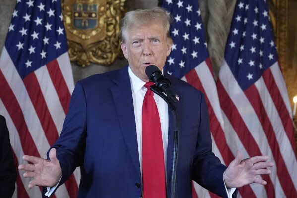 FILE - Republican presidential candidate former President Donald Trump speaks at a news conference, April 12, 2024, at Mar-a-Lago in Palm Beach, Fla. At rallies and in social media posts, former President Donald Trump has been trying to assure Republican voters that casting ballots by mail and other forms of early voting are “all good options.” (AP Photo/Wilfredo Lee, File)