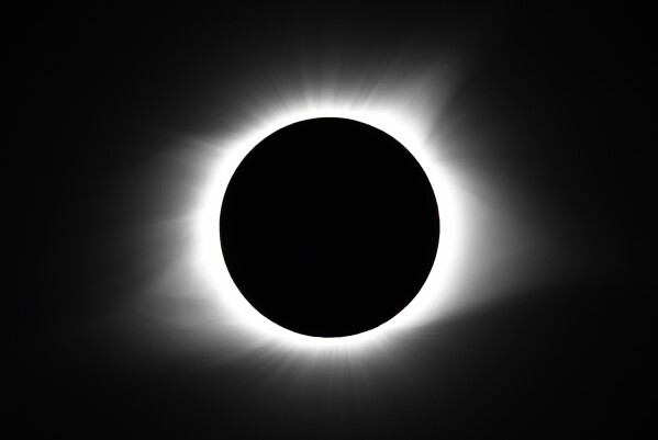 FILE - The moon covers the sun during a total solar eclipse Monday, Aug. 21, 2017, in Cerulean, Ky. On April 8, 2024, the sun will pull another disappearing act across parts of Mexico, the United States and Canada, turning day into night for as much as 4 minutes, 28 seconds. (AP Photo/Timothy D. Easley, File)