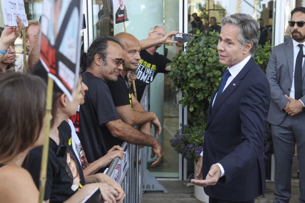 U.S. Secretary of State Antony Blinken meets with families and supporters of Israelis held hostage by Hamas in Gaza, during his visit to Tel Aviv, Israel, Tuesday, June 11, 2024. (Jack Guez, Pool Photo via AP)