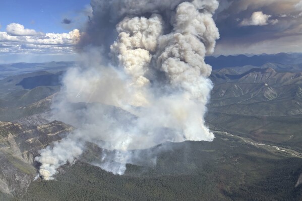 A wildfire burning northeast of Summit Lake, British Columbia, Canada, is seen in this handout image on Monday, June 2, 2025. (BC Wildfire Service/The Canadian Press via AP)