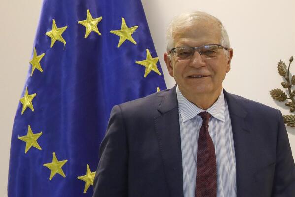 European Union High Representative for Foreign Affairs and Security Policy Josep Borrell looks on next to the EU flag, upon his meeting with North Macedonia's President Stevo Pendarovski at the Presidential office in Skopje, North Macedonia, Monday, March 14, 2022. The EU top official has started Monday his Western Balkan tour visiting North Macedonia and then Albania and Bosnia and Herzegovina in a bid to reaffirm the EU's commitment and support to the region, also in view of the Russian war against Ukraine and its impact on the security of Europe as a whole. (AP Photo/Boris Grdanoski)