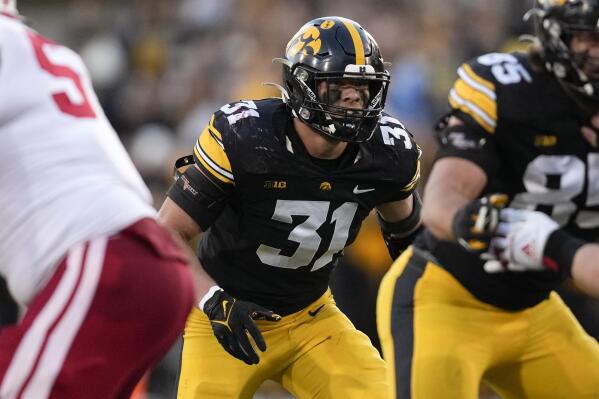 FILE - Iowa linebacker Jack Campbell (31) gets set for a play during the first half of an NCAA college football game against Nebraska on Nov. 25, 2022, in Iowa City, Iowa. Iowa (7-5) and Kentucky (7-5) will face off on Saturday, Dec. 31, 2022, in the Music City Bowl. (AP Photo/Charlie Neibergall, File)