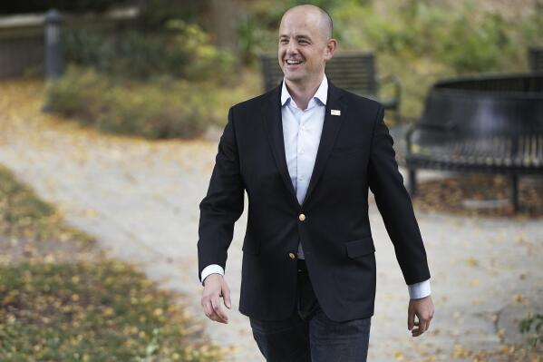Evan McMullin walks back to his car after an interview in Salt Lake City, Tuesday, Oct. 5, 2021. McMullin is running for Sen. Mike Lee's seat as an independent. (Jeffrey D. Allred/The Deseret News via AP)