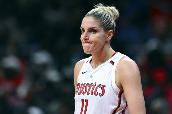 FILE - Washington Mystics' Elena Delle Donne (11) looks on during a break in the action in the first half of a WNBA basketball game against the Indiana Fever, Friday, May 6, 2022, in Washington. The Mystics star, a two-time WNBA MVP, might step away from basketball for an undetermined period of time, according to multiple reports. ESPN, citing anonymous sources, reported Wednesday, Feb. 7, 2024, that Delle Donne does not intend to sign the one-year supermax deal the Mystics have offered her. (APPhoto/Terrance Williams, File)