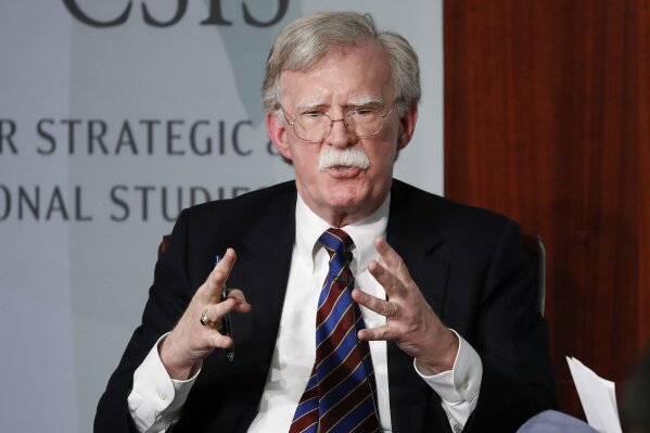 FILE - In this Sept. 30, 2019 file photo, former National security adviser John Bolton gestures while speaking at the Center for Strategic and International Studies (CSIS) in Washington. A judge ruled on Thursday that the Trump administration can move forward with its lawsuit against former national security adviser John Bolton over that his tell-all book, which officials say contains classified information.  (AP Photo/Pablo Martinez Monsivais)