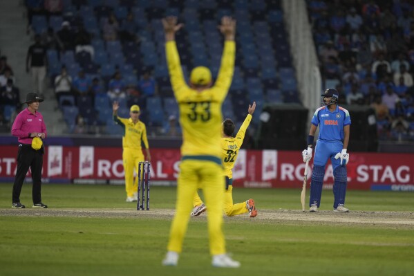 Australian players appeals unsuccessfully for the wicket of India's Virat Kohli during the ICC Champions Trophy semifinal cricket match between India and Australia at Dubai International Cricket Stadium in Dubai, United Arab Emirates, Tuesday, March 4, 2025. (AP Photo/Altaf Qadri)