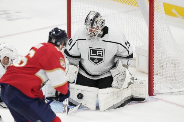 Florida Panthers center Aleksander Barkov (16) attempts a shot at Los Angeles Kings goaltender Pheonix Copley (29) during the second period of an NHL hockey game, Friday, Jan. 27, 2023, in Sunrise, Fla. (AP Photo/Wilfredo Lee)