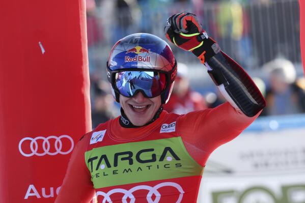 Switzerland's Marco Odermatt reacts after completing an alpine ski, men's World Cup super-G, in Cortina d'Ampezzo, Italy, Sunday, Jan. 29, 2023. (AP Photo/Alessandro Trovati)