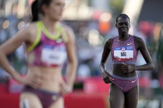 Athing Mu is in last place after falling in the women's 800-meter final during the U.S. Track and Field Olympic Team Trials Monday, June 24, 2024, in Eugene, Ore. (AP Photo/George Walker IV)