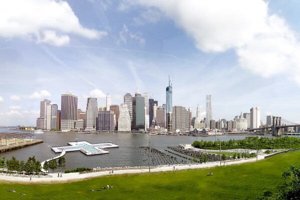 This + POOL rendering, designed by PLAYLAB, INC. & Family New York, shows a proposed floating pool off the Brooklyn Bridge Park shoreline in New York. New York Governor Kathy Hochul has announced support for a plan to build a floating swimming pool in New York City's waterways. (Courtesy Friends of + POOL via AP)