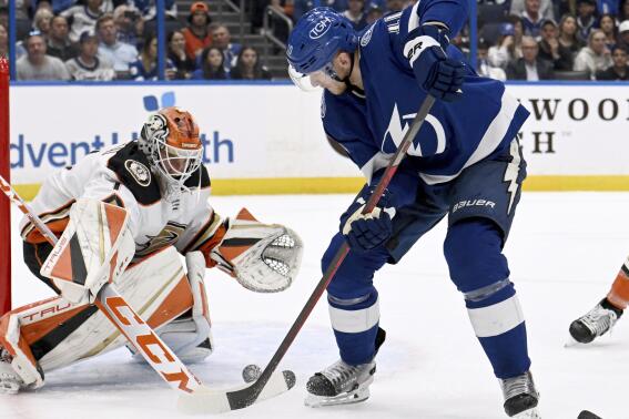 Tampa Bay Lightning right wing Corey Perry (10) looks to shoot against Anaheim Ducks goaltender Lukas Dostal during the second period of an NHL hockey game Tuesday, Feb. 21, 2023, in Tampa, Fla. (AP Photo/Jason Behnken)