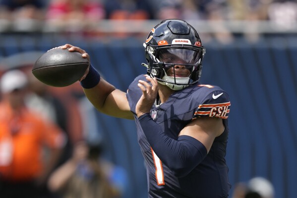 Chicago Bears quarterback Justin Fields throws during the first half of an NFL preseason football game against the Buffalo Bills, Saturday, Aug. 26, 2023, in Chicago. (AP Photo/Charles Rex Arbogast)
