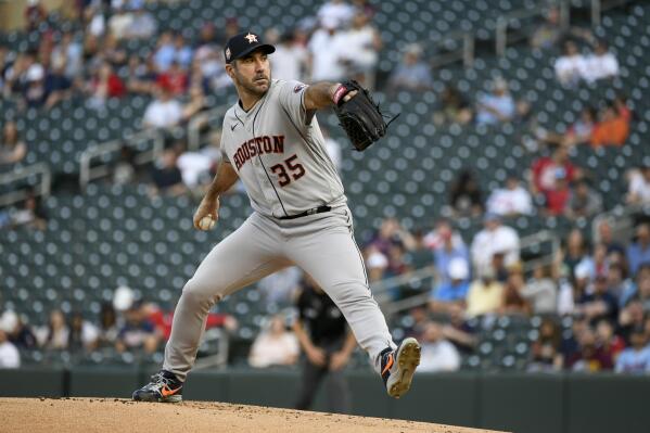Houston Astros pitcher Justin Verlander throws against the Minnesota Twins during the first inning of a baseball game, Tuesday, May 10, 2022, in Minneapolis. (AP Photo/Craig Lassig)