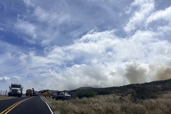 This photo provided by the Maui Fire Department shows smoke from a fire burning in Kahikinui, Hawaii on the island of Maui on Sunday, June 15, 2025. (Maui Fire Department via AP)