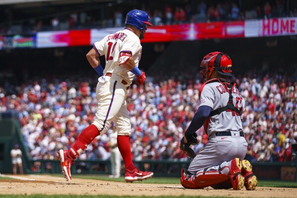 Kyle Schwarber and Aaron Nola lead the way as Phillies bounce back to slam  Cubs, 12-3