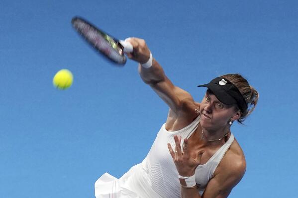 Liudmila Samsonova of Russia serves against Garbine Muguruza of Spain during a singles quarterfinal match in the Pan Pacific Open tennis tournament at Ariake Colosseum Friday, Sept. 23, 2022, in Tokyo. (AP Photo/Eugene Hoshiko)