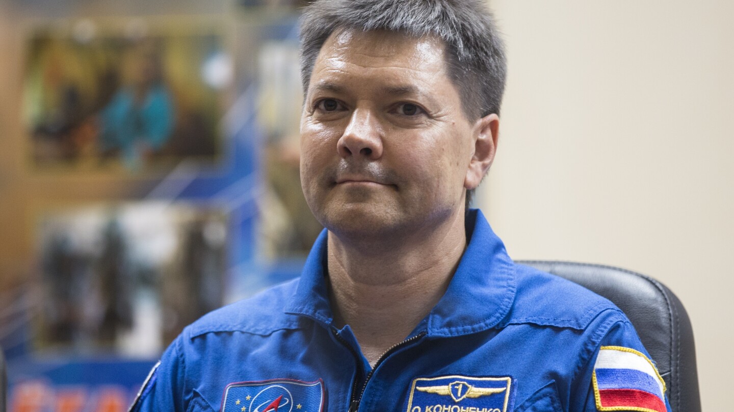 FILE _ Russian cosmonaut Oleg Kononenko, a crew member of the next mission to the International Space Station, attends a news conference at the Russia