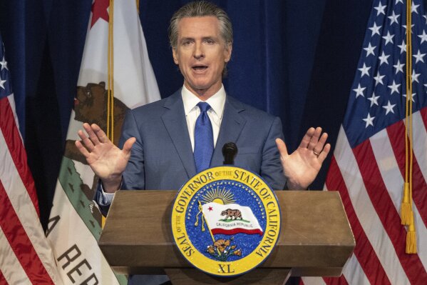 FILE - California Gov. Gavin Newsom speaks during a news conference on Friday, May 12, 2023, in Sacramento, Calif. Newsom has been in touch with all sides of the strike impacting Hollywood, his office said Wednesday, July 26. But so far, neither the studio executives nor actors and writers have shown formal interest in inviting him to help mediate the dispute. (Hector Amezcua/The Sacramento Bee via AP, File)