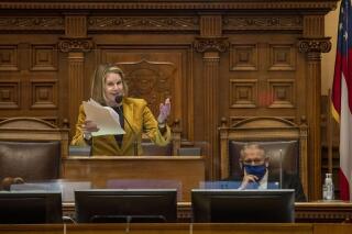 FILE – Georgia House Speaker Pro Tem Jan Jones, a Milton Republican, speaks to the House on at the Georgia State Capitol in Atlanta, on Monday, Jan. 11, 2021. Jones is working on a bill in the 2022 regular session to better prevent students from viewing inappropriate material on the internet.(Alyssa Pointer/Atlanta Journal-Constitution via AP)