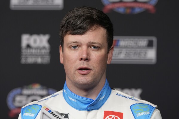 FILE - Erik Jones during the NASCAR Daytona 500 auto racing media day Wednesday, Feb. 14, 2024, at Daytona International Speedway in Daytona Beach, Fla. Jones suffered a compression fracture in a lower vertebra in a wreck at Talladega and will not drive this weekend in the NASCAR Cup series race at Dover Motor Speedway. Corey Heim will substitute for Jones in the No. 43 Toyota for Legacy Motor Club. (AP Photo/Chris O'Meara, File)