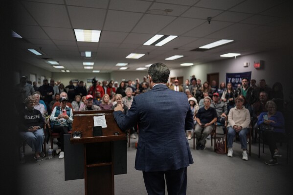 Speaker of the House Mike Johnson, R-La., speaks during a campaign event at the Lucas County Republican Party headquarters in Holland, Ohio, Saturday, Oct. 26, 2024. (AP Photo/Carolyn Kaster)