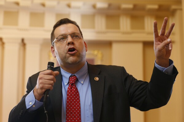 FILE - Then-state Sen. Thomas Garrett, R-Buckingham, speaks during a debate on a bill during the Senate session at the Capitol in Richmond, Va., Jan. 20, 2015. (AP Photo/Steve Helber, File)