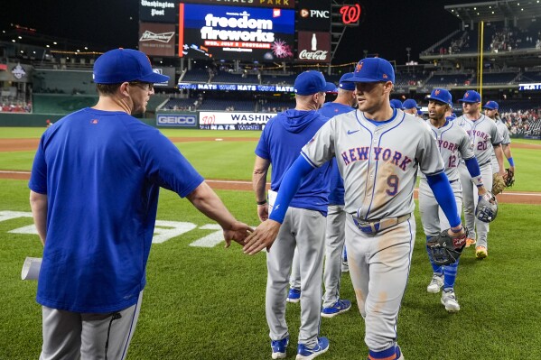 Nimmo returns from hotel room scare to drive in 2 runs as the Mets beat the Nationals  7-2 in 10 | AP News