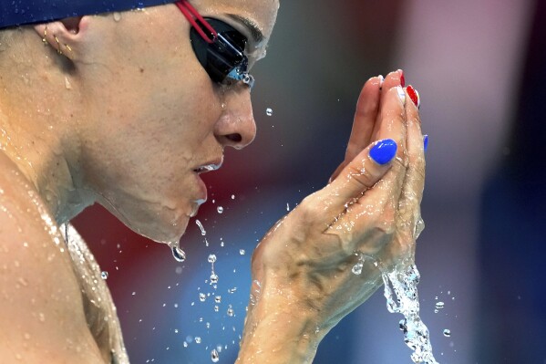 France's Melanie Henique prepares for a women's 50-meter freestyle heat at the Summer Olympics in Nanterre, France, Saturday, Aug. 3, 2024. (AP Photo/Natacha Pisarenko)