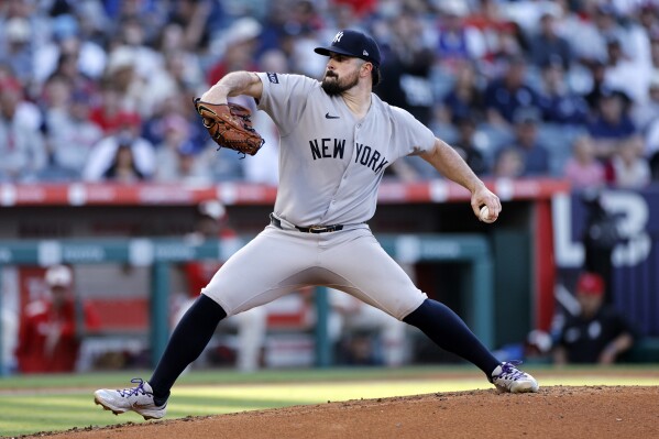 New York Yankees pitcher Carlos Rodón throws against the Los Angeles Angels during the first inning of a baseball game Tuesday, May 27, 2025, in Anaheim, Calif. (AP Photo/Kevork Djansezian)