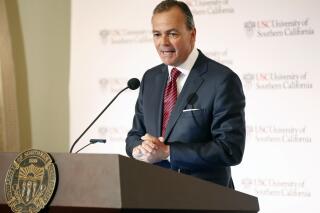 FILE - Rick Caruso, chairman of the University of Southern California Board of Trustees announces Carol Folt as the USC's 12th president in Los Angeles Wednesday, March 20, 2019. The billionaire developer announced Friday, Feb. 11, 2022 that he is going to enter the race for L.A. mayor. (AP Photo/Damian Dovarganes, File)