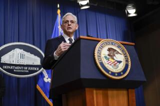 Attorney General Merrick Garland speaks during a news conference at the Department of Justice in Washington, Friday, Jan. 27, 2023, to discuss recent law enforcement action in transnational security threats case. (AP Photo/Carolyn Kaster)