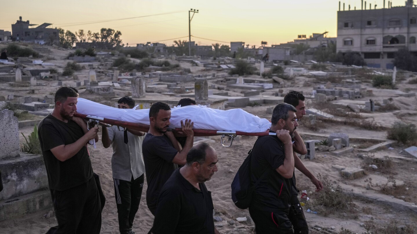 As Gaza death toll passes 40,000, corpses are buried in yards, streets, tiered graves