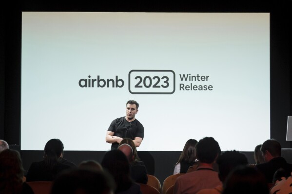 FILE - Airbnb co-founder and CEO Brian Chesky unveils Airbnb's 2023 Winter Release on Nov. 7, 2023, in New York. Airbnb on Tuesday, Jan. 23, 2024, donated a total of $10 million to more than 120 nonprofits in 44 countries on six continents, as the rental giant continued its unusual distribution of $100 million through its Airbnb Community Fund. (Carla Torres/AP Images for Airbnb, File)