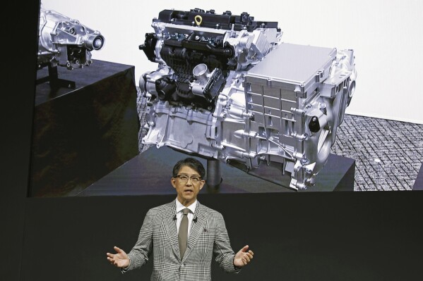 Koji Sato, chief executive of Toyota Motor Corp., speaks during a news conference in Tokyo, Tuesday, May 28, 2024. “An engine reborn.” That's how Japanese automaker Toyota introduced plans for a new lean compact motor that will cast a futuristic spin on the traditional internal combustion engine. (Kyodo News via AP)