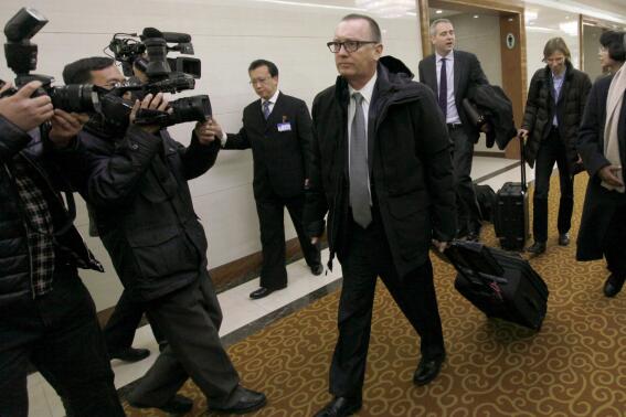 FILE - Then U.N. Under-Secretary-General for Political Affairs Jeffrey Feltman, center, walks upon arrival at the Pyongyang International Airport in Pyongyang, North Korea on Dec. 5, 2017. The U.S. State Department said in a statement Thursday, Jan. 6, 2022 that its special envoy to the Horn of Africa, Jeffrey Feltman, will end his appointment "in the coming days" after a year marked by deadly crises in Ethiopia and Sudan. (AP Photo/Jon Chol Jin, File)