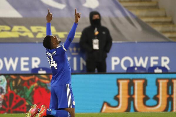 Leicester's Kelechi Iheanacho celebrates after scoring his side's second goal during the English Premier League soccer match between Leicester City and Crystal Palace at the King Power Stadium in Leicester, England, Monday, April 26, 2021. (Andrew Boyers/Pool via AP)