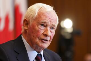 Independent Special Rapporteur on Foreign Interference David Johnston presents his first report in Ottawa, Ontario, on Tuesday, May 23, 2023. Johnston rejected holding a public inquiry into leaked intelligence that alleged China interfered in Canada’s federal elections, drawing allegations of a cover-up from the Conservative opposition. (Sean Kilpatrick/The Canadian Press via AP)