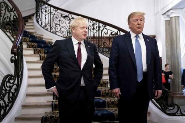 President Donald Trump and Britain's Prime Minister Boris Johnson, left, speak to the media before a working breakfast meeting at the Hotel du Palais on the sidelines of the G-7 summit in Biarritz, France, Sunday, Aug. 25, 2019. (Erin Schaff, The New York Times, Pool)