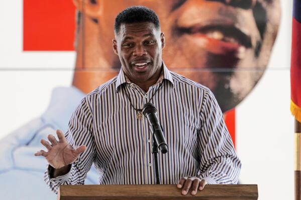 FILE - Republican candidate for U.S. Senate Herschel Walker speaks during a campaign stop in Dawsonville, Ga., Oct. 25, 2022. A woman came forward Wednesday, Oct. 26, to accuse Walker of encouraging and paying for her 1993 abortion, an accusation that came just weeks after a former girlfriend said he did the same for her in 2009.(AP Photo/John Bazemore, File)