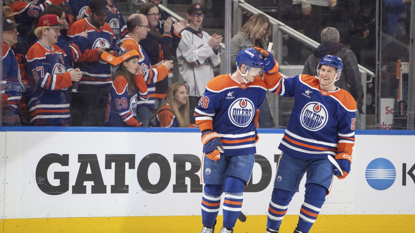 McDavid, Oilers wrap up a playoff spot with a 4-2 victory over the Sharks