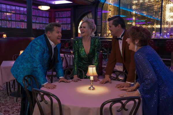 This image released by Netflix shows, from left, James Corden, Nicole Kidman, Andrew Rannells and Meryl Streep in a scene from "The Prom." (Melinda Sue Gordon/Netflix via AP)