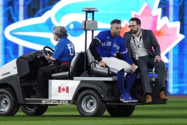 Blue Jays' George Springer carted off after colliding with Bo Bichette