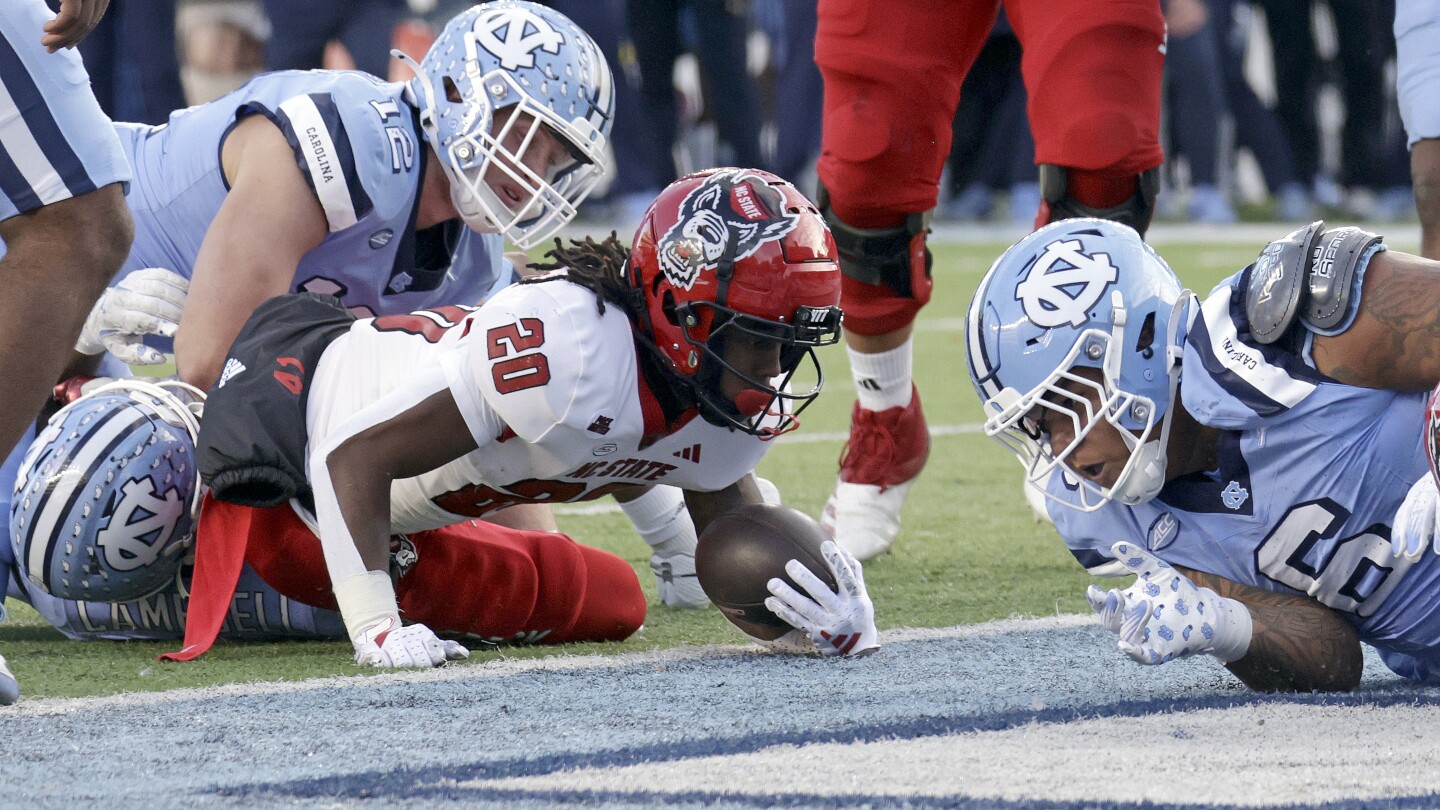 Late TD helps NC State edge UNC 35-30 in Mack Brown’s farewell at UNC