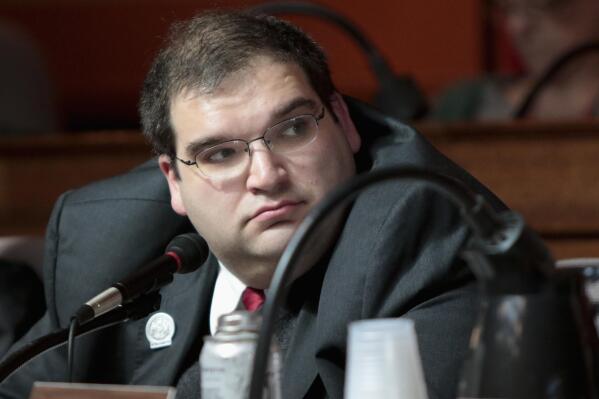 FILE - In this March 2, 2015, file photo shows Wisconsin Republican state Rep. Andre Jacques at a labor committee hearing at the State Capitol in Madison, Wis.  Jacques, one of the Legislature's most conservative lawmakers and a vocal opponent of mask and vaccine mandates, tested positive for COVID-19 last week and was at the hospital on Monday, Aug. 16, 2021 with pneumonia. (Michael P. King/Wisconsin State Journal via AP, File)
