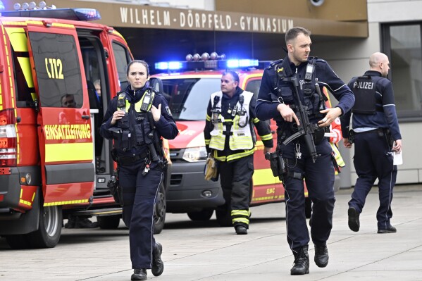 Police and ambulances at the scene of an attack, at the Wilhelm D枚rpfeld school, in Wuppertal, Germany, Thursday, Feb. 22, 2024. Police say five people have been injured in an incident at a school in the western German city of Wuppertal and a suspect has been arrested. The incident took place on Thursday at a high school. Police said there was no shooting in the incident but gave no further information. (Roberto Pfeil/dpa via 番茄直播)