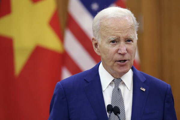 FILE - US President Joe Biden addresses the media during a press briefing at the headquarter of CPV Central Committee in Hanoi, Vietnam, on Sept.10, 2023. Police in Vietnam announced Thursday May 9, 2024 that they have arrested a senior official of the country’s labor ministry for 
