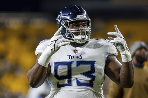 FILE - Tennessee Titans defensive tackle Teair Tart (93) gestures during warmups before an NFL football game, Thursday, Nov. 2, 2023, in Pittsburgh. The Miami Dolphins are signing defensive tackle Teair Tart to a one-year deal to further bolster their defense, a person with knowledge of the negotiations told The Associated Press Friday, April 5, 2024. (AP Photo/Matt Durisko, File)