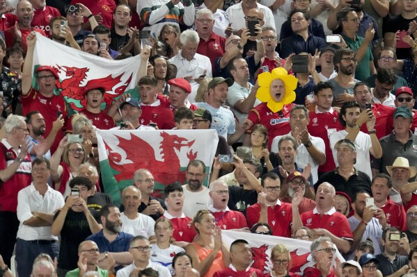 Wales' fans attend the Rugby World Cup Pool C match between Wales and Fiji at the Stade de Bordeaux in Bordeaux, France, Sunday, Sept. 10, 2023. (AP Photo/Themba Hadebe)