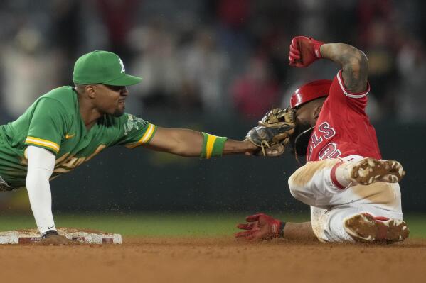 A's hit 5 home runs, rally for 11-10 win over Angels in 10 - The San Diego  Union-Tribune